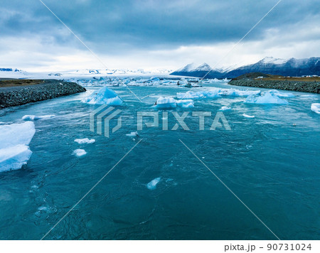 Scenic view of icebergs in Jokulsarlon glacier lagoon, Iceland, at dusk. 90731024