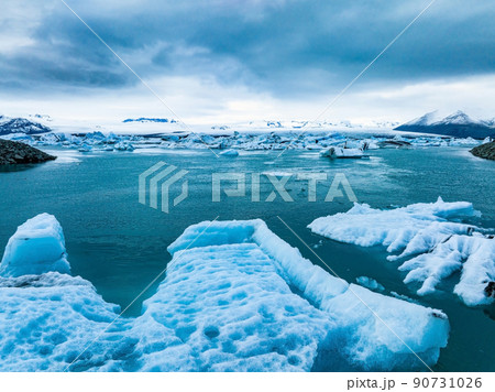 Scenic view of icebergs in Jokulsarlon glacier lagoon, Iceland, at dusk. 90731026