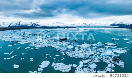 Scenic view of icebergs in Jokulsarlon glacier lagoon, Iceland, at dusk. Scenic view of icebergs in Jokulsarlon glacier lagoon, Iceland, at dusk. 90731030