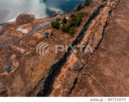 The well visible tectonic plate at Thingvellir National Park in Iceland. 90731074