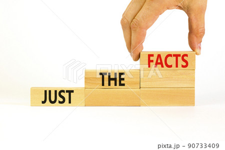Just the facts symbol. Concept words Just the facts on wooden blocks on a beautiful white table white background. Businessman hand. Business and just the facts concept. Copy space. Just the facts symbol. Concept words Just the facts on wooden blocks on a beautiful white table white background. Businessman hand. Business and just the facts concept. Copy space. 90733409