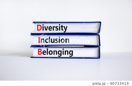 DIB, Diversity, inclusion and belonging symbol. Books with words DIB, diversity, inclusion and belonging on beautiful white background. Business, diversity, inclusion and belonging concept. DIB, Diversity, inclusion and belonging symbol. Books with words DIB, diversity, inclusion and belonging on beautiful white background. Business, diversity, inclusion and belonging concept. 90733419