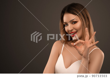 Beautiful flirty woman. Clear skin. SPA concept. Natural beauty. Stylish model 90733503