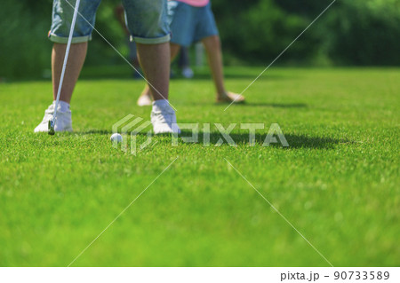 Playing golf. Golf course. Playing golf. Golf course. 90733589