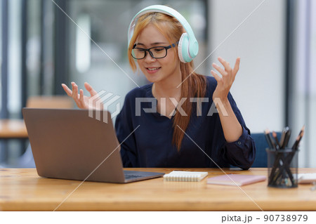 Portrait of Young Asian woman using social media by laptop. Lifestyle ,Shopping online concept. 90738979