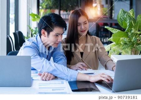 Group of Asian Business people consult advice about finance plan. Account concept. Group of Asian Business people consult advice about finance plan. Account concept. 90739181