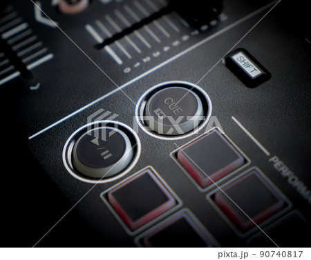 Hand pressing on Music playing button on DJ Mixing Deck controller equipment. Hand pressing on Music playing button on DJ Mixing Deck controller equipment. 90740817