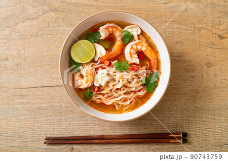 instant noodles ramen in spicy soup with shrimps (Tom Yum Kung) instant noodles ramen in spicy soup with shrimps (Tom Yum Kung) 90743759