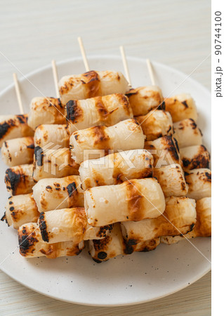 grilled tube shaped fish paste cake skewe or tube squid skewer 90744100