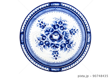 Plate Bowl Dishes Porcelain Ceramic Isolated on white background. Front Top view. Cobalt Blue color traditional folk painting Floral Pattern. Souvenir Decor for home interior of premises. Plate Bowl Dishes Porcelain Ceramic Isolated on white background. Front Top view. Cobalt Blue color traditional folk painting Floral Pattern. Souvenir Decor for home interior of premises. 90748435