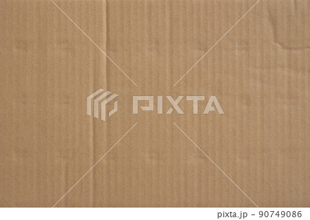 Old cardboard background with folds and creases. Old cardboard background with folds and creases. 90749086