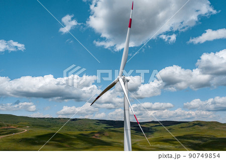 Closeup view of Wind Turbines on Windmill Energy Farm 90749854