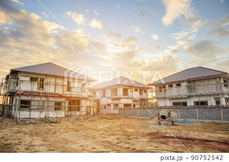construction residential new house in progress at building site construction residential new house in progress at building site 90752542