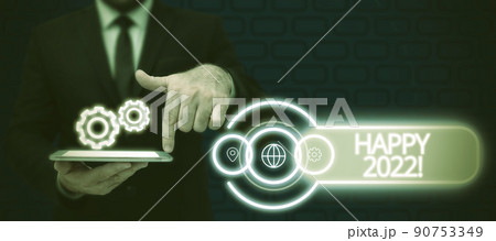 Conceptual caption Happy 2022. Business approach time or day at which a new calendar year begin from now Lady in suit holding pen symbolizing successful teamwork accomplishments. 90753349