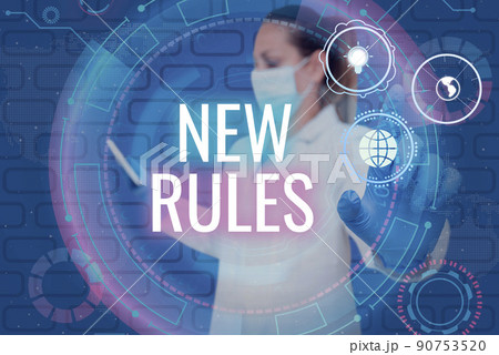 Handwriting text New Rules. Word Written on A state of changing an iplemented policy for better upgrade Nurse in uniform pointing upwards represents global innovative thinking. 90753520