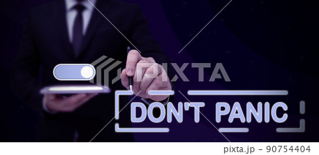 Hand writing sign Don T Not Panic. Business approach sudden strong feeling of fear prevents reasonable thought Lady in suit holding pen symbolizing successful teamwork accomplishments. Hand writing sign Don T Not Panic. Business approach sudden strong feeling of fear prevents reasonable thought Lady in suit holding pen symbolizing successful teamwork accomplishments. 90754404