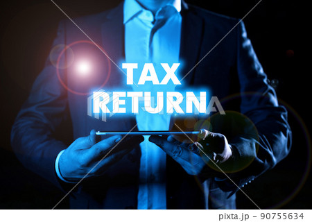 Text caption presenting Tax Return. Business concept which taxpayer makes annual statement of income circumstances Businessman in suit holding notepad symbolizing successful teamwork. Text caption presenting Tax Return. Business concept which taxpayer makes annual statement of income circumstances Businessman in suit holding notepad symbolizing successful teamwork. 90755634