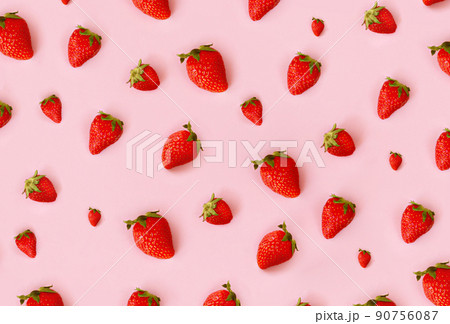 Fresh red strawberry on pink background, top view. Minimalistic scattered berries pattern. Creative food concept. Flat lay, copy space, top view Fresh red strawberry on pink background, top view. Minimalistic scattered berries pattern. Creative food concept. Flat lay, copy space, top view 90756087