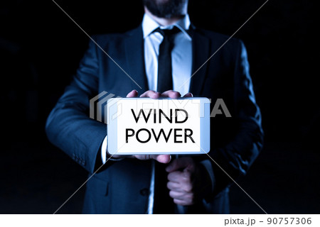 Sign displaying Wind Power. Business idea use of air flowto provide mechanical power to turn generators -47700 90757306