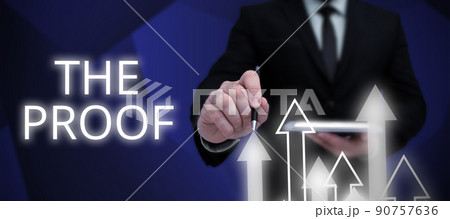 Inspiration showing sign The Proof. Internet Concept Evidence by nature of any actions or words with a thing to see Businessman in suit holding open palm symbolizing successful teamwork. 90757636