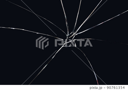 Texture broken glass with cracks on black background. Abstract cracked screen 90761354