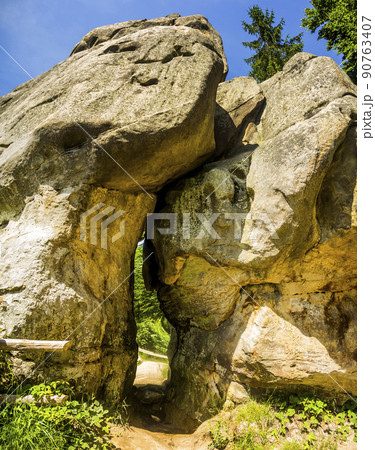 rocks with recesses for the wooden beams in Tustan fortress place, Skole Beskids National Nature Park, Lviv region, Ukraine 90763407
