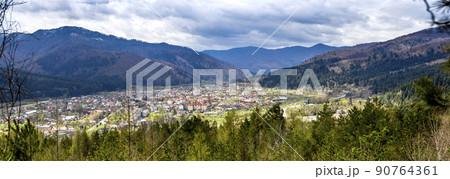the panoramic aerial view of Skole town in Carpathian mountains, national park Skolivski beskidy, Ukraine the panoramic aerial view of Skole town in Carpathian mountains, national park Skolivski beskidy, Ukraine 90764361