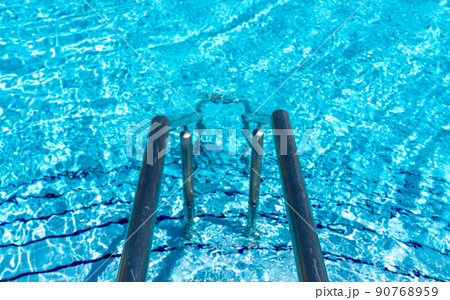 Swimming pool steps with clear water surface background, nobody Swimming pool steps with clear water surface background, nobody 90768959
