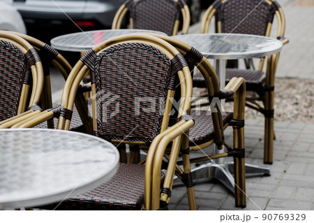 coffee terrace with tables and chairs. coffee terrace with tables and chairs. 90769329