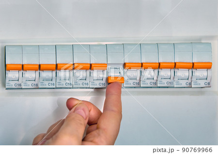 Turning on circuit breaker on control panel after it has tripped due to overload. Turning on circuit breaker on control panel after it has tripped due to overload. 90769966