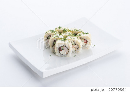 Japanese food restaurant, sushi maki gunkan roll plate or platter set. Sushi set and composition Japanese food restaurant, sushi maki gunkan roll plate or platter set. Sushi set and composition 90770364