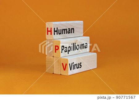 HPV, Human papilloma virus symbol. Concept words HPV, Human papilloma virus on wooden blocks on a beautiful orange background. Medical, HPV, Human papilloma virus concept. Copy space. HPV, Human papilloma virus symbol. Concept words HPV, Human papilloma virus on wooden blocks on a beautiful orange background. Medical, HPV, Human papilloma virus concept. Copy space. 90771567