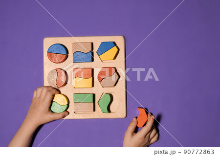 Montessori activity, learning about color, shape, sorting, 90772863