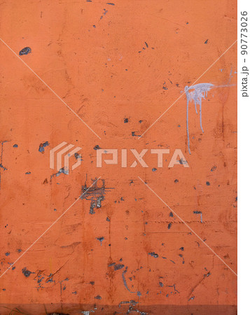 Orange Texture old wall with peeling paint, scratches and cracks Orange Texture old wall with peeling paint, scratches and cracks 90773026