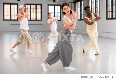 dancers training in a dance studio 90776413