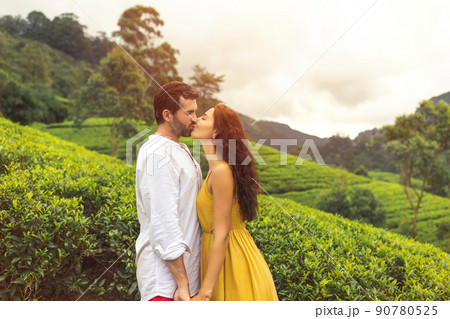 Couple of Travelers in Love in Front of Nature Background Tea Plantations Landscape 90780525