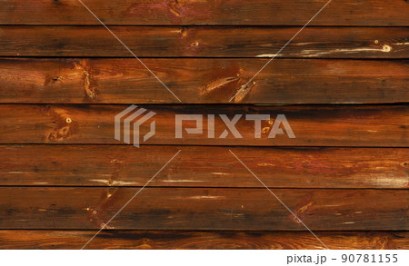 Old Weathered Natural Log Cabin Aged Wall Facade Texture. Rustic Log Wall Horizontal Brown Background. wide horizontal wooden planks 90781155