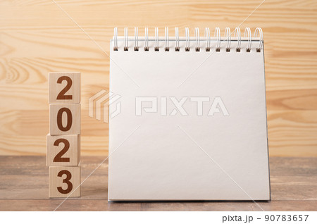 2023 time for new start. Plan words and 2023 cubes wooden table background. New Year. Calendar desk 2023 for organizer to plan and reminder on wooden background 90783657