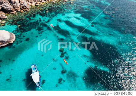 Boats and crystal clear waters at the bay dive site in Koh Tao,diving tour boat Boats and crystal clear waters at the bay dive site in Koh Tao,diving tour boat 90784300