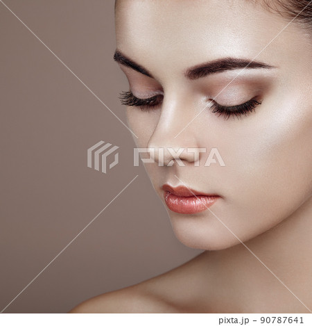 Beautiful woman face 90787641