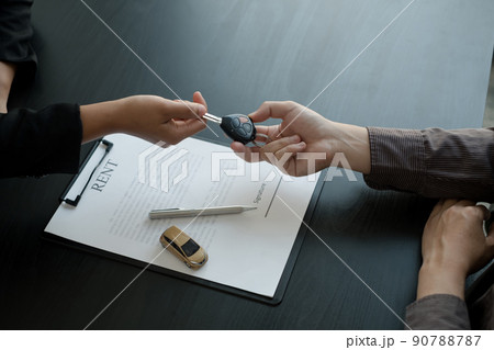 The car dealer provides advice on loans, insurance details, and car rental information, and delivers the car with the keys after the rental contract is signed 90788787