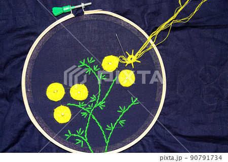 woolen handicraft work with circle frame on cloth woolen handicraft work with circle frame on cloth 90791734
