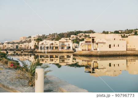 Ras Al Khaimah, UAE - April 2022 - Sea view and private villas at Cove Rotana Resort 90796773