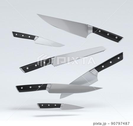 Set of fluing chef's kitchen knives with a wooden handle on white background. Set of fluing chef's kitchen knives with a wooden handle on white background. 90797487