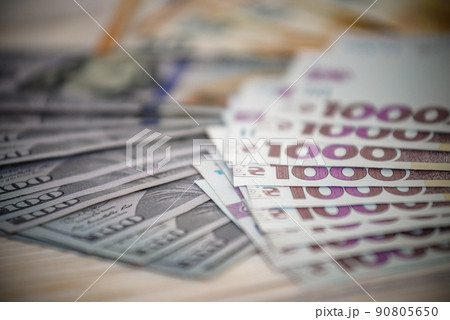 Dollar banknotes of the USA. Amerikan dollars. Money of USA and Ukrainian hryvnia. 1000 Ukrainian hryvnia Dollar banknotes of the USA. Amerikan dollars. Money of USA and Ukrainian hryvnia. 1000 Ukrainian hryvnia 90805650