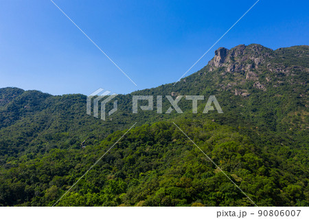 Lion Rock mountain over blue sky in Hong Kong 90806007