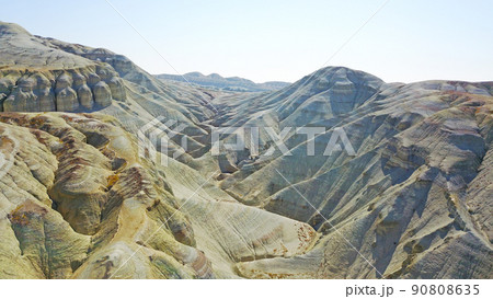 Colored mountains of Aktau in the steppe. Colored mountains of Aktau in the steppe. 90808635