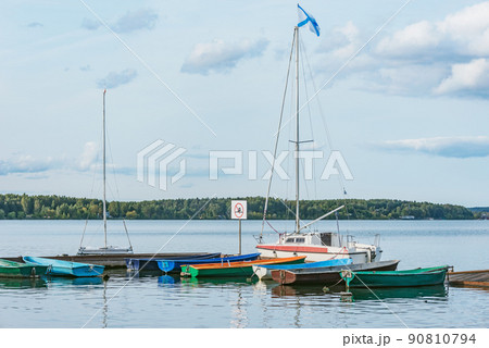 Boats by the pier. Boats by the pier. 90810794