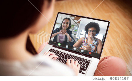 Female freelancer video conferencing african american businesswomen while working from home Female freelancer video conferencing african american businesswomen while working from home 90814197