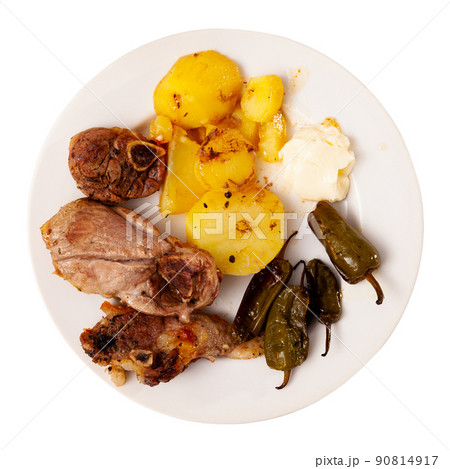 Dish of lamb leg with potatoes and pepper Dish of lamb leg with potatoes and pepper 90814917